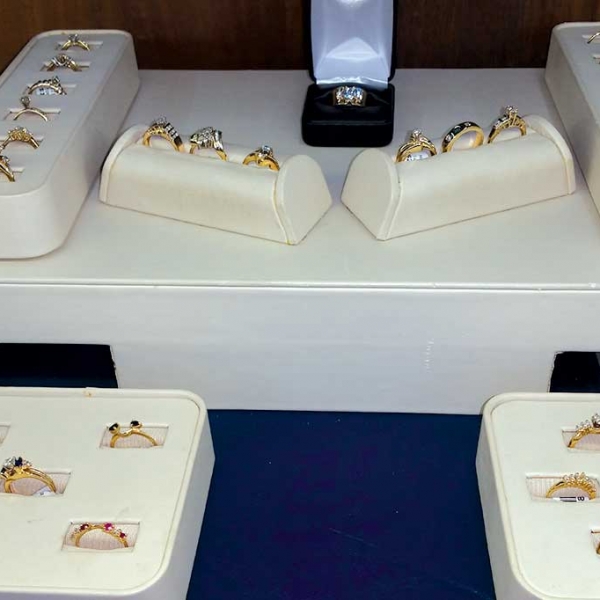 gold rings for sale in a display case